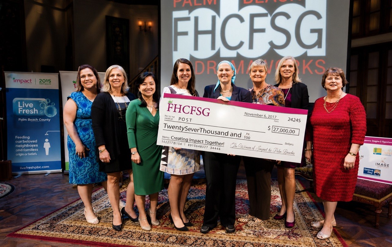 POST — Creating Impact Together receiving a grant check